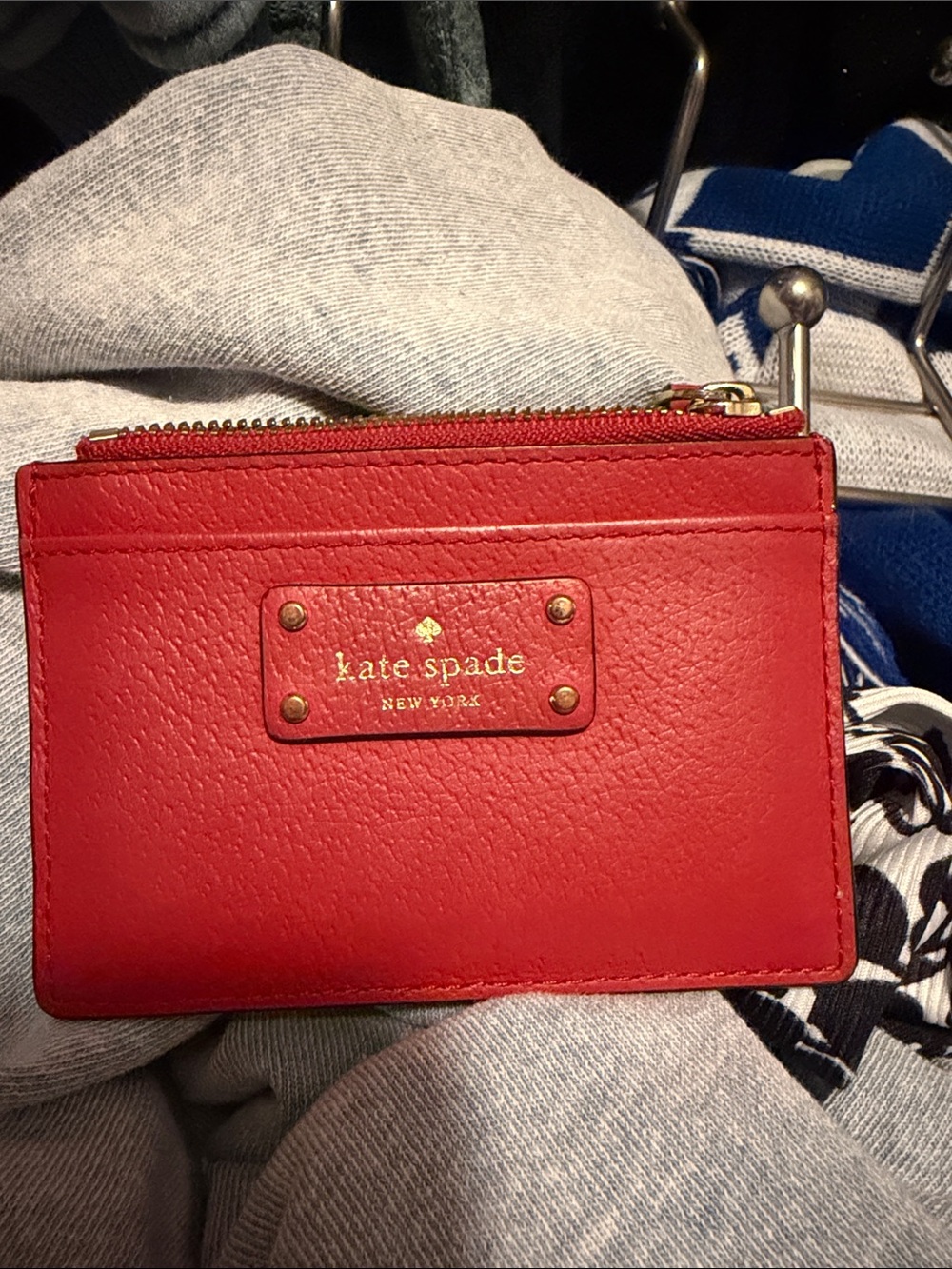 kate spade red leather card case with gold logo plate